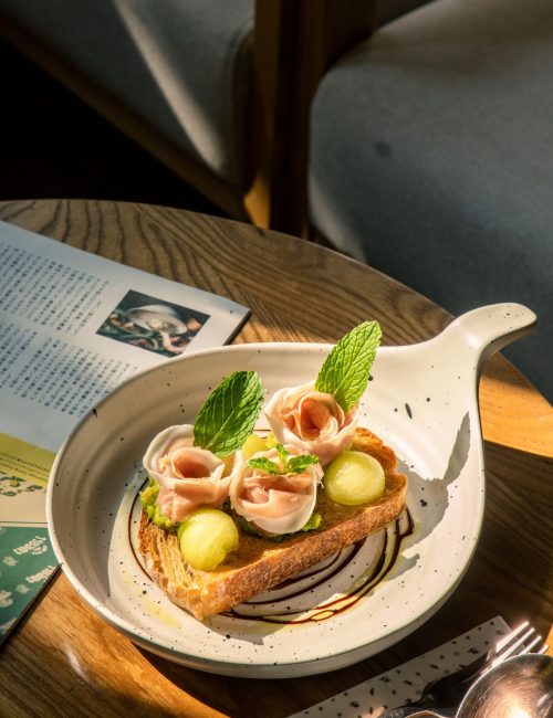 Parma melon toast with avocado cream